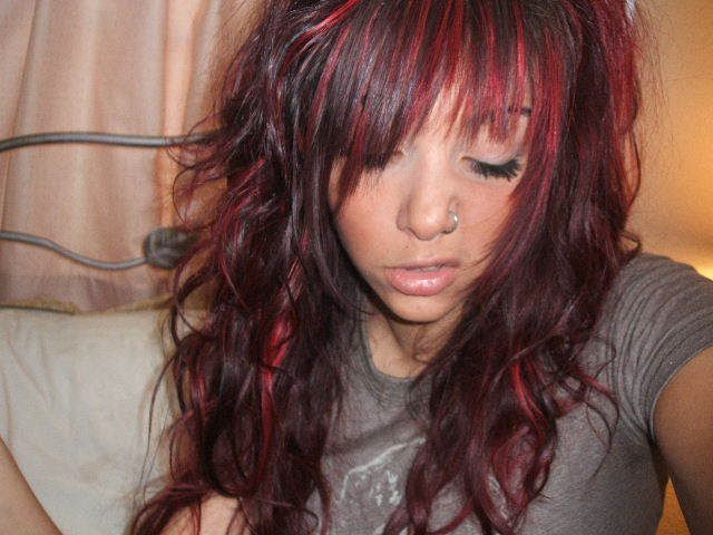 Redhead with Dark Red Scene Hair and Nose Piercing/Ring