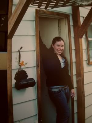 Me in the doorway to our cozy cottage