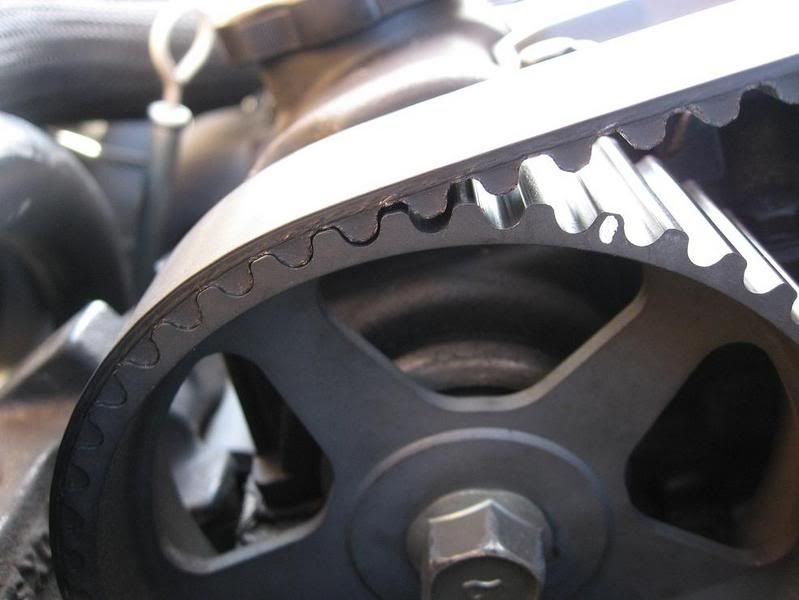 new timing belt making noise (whirring) and has wear marks on sides