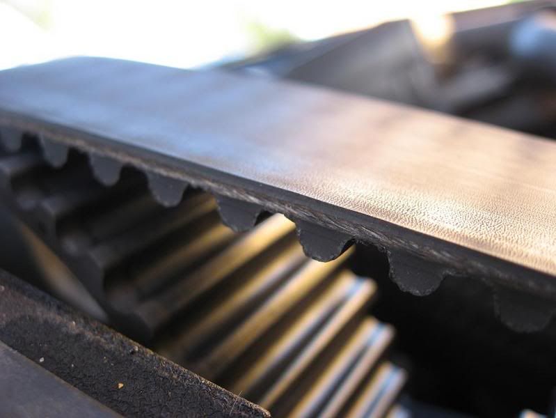 new timing belt making noise (whirring) and has wear marks on sides