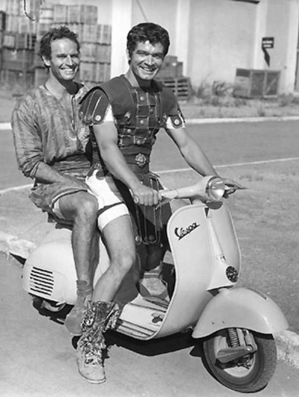  photo CharltonHestonRidingaScooterDuringFilmingofBenHur19595.jpg