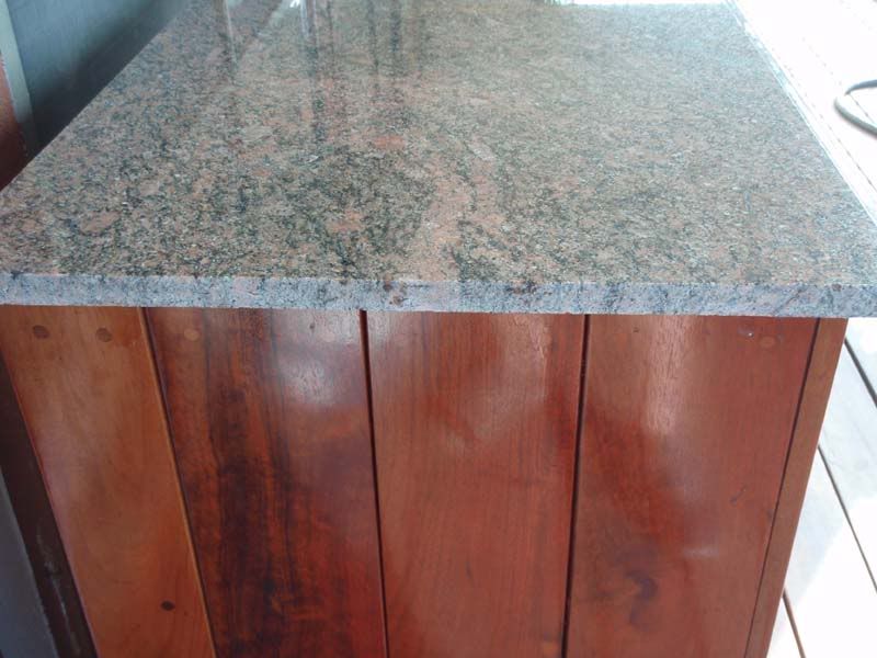 Attaching wood trim to granite